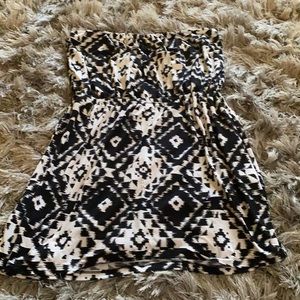 Black and white pattern tube top mini dress.